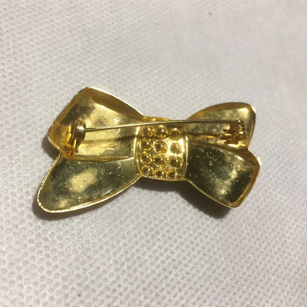 Goldtone Bow Pin with Rhinestones